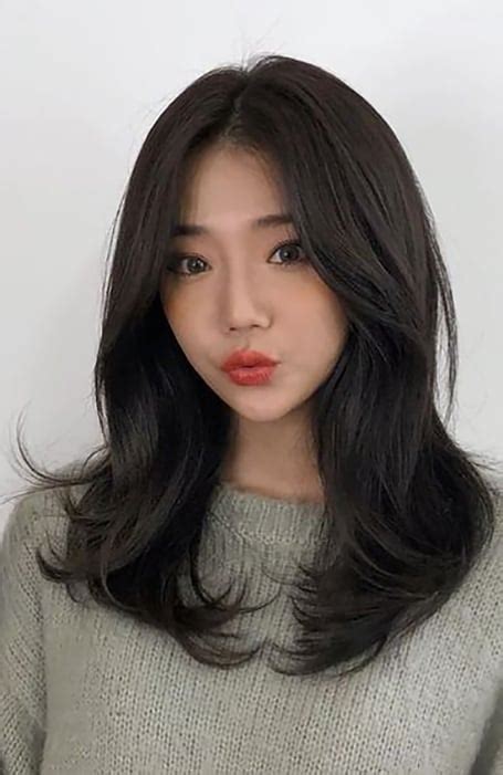 This highlights the <strong>long</strong> curls and creates an elongated aspect of your face. . Long layered haircuts asian